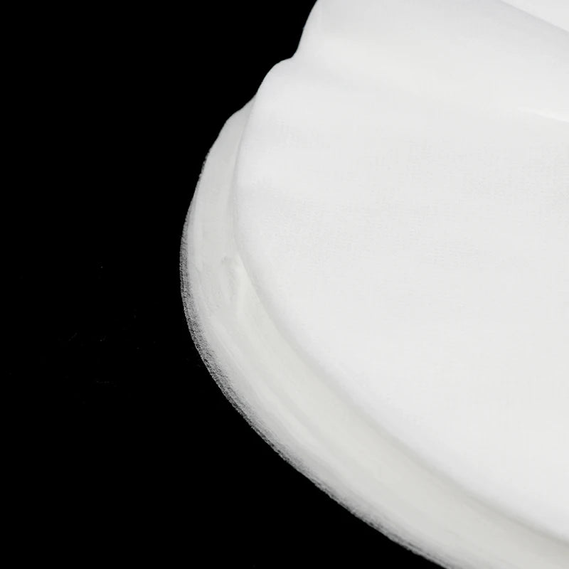 Lot de cent masques pour le visage à utiliser sur table de massage
