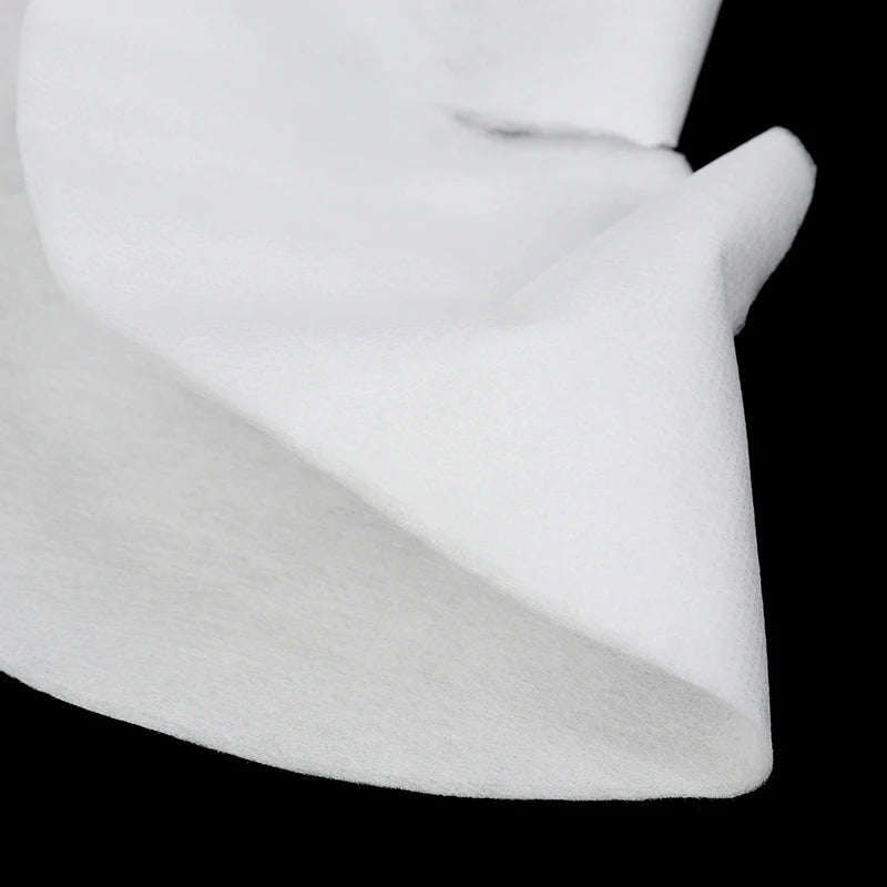 Lot de cent masques pour le visage à utiliser sur table de massage