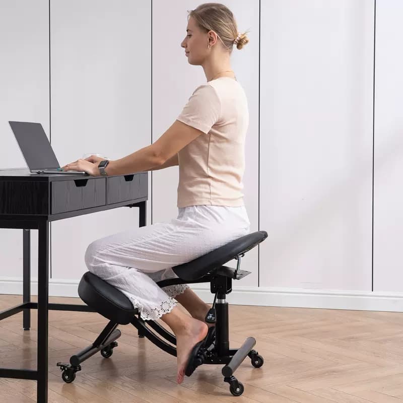 Tabouret ergonomique noir à repose-pieds