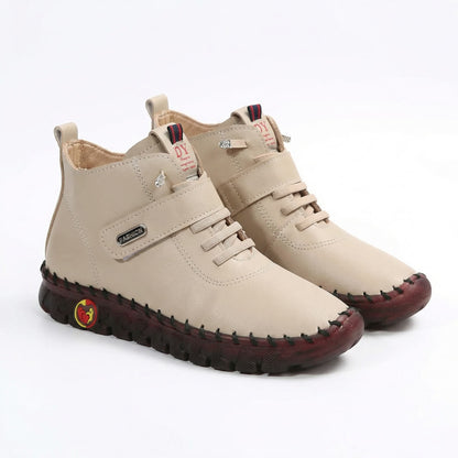 Paire de chaussures bottines orthopédiques beiges à lacets pour femme
