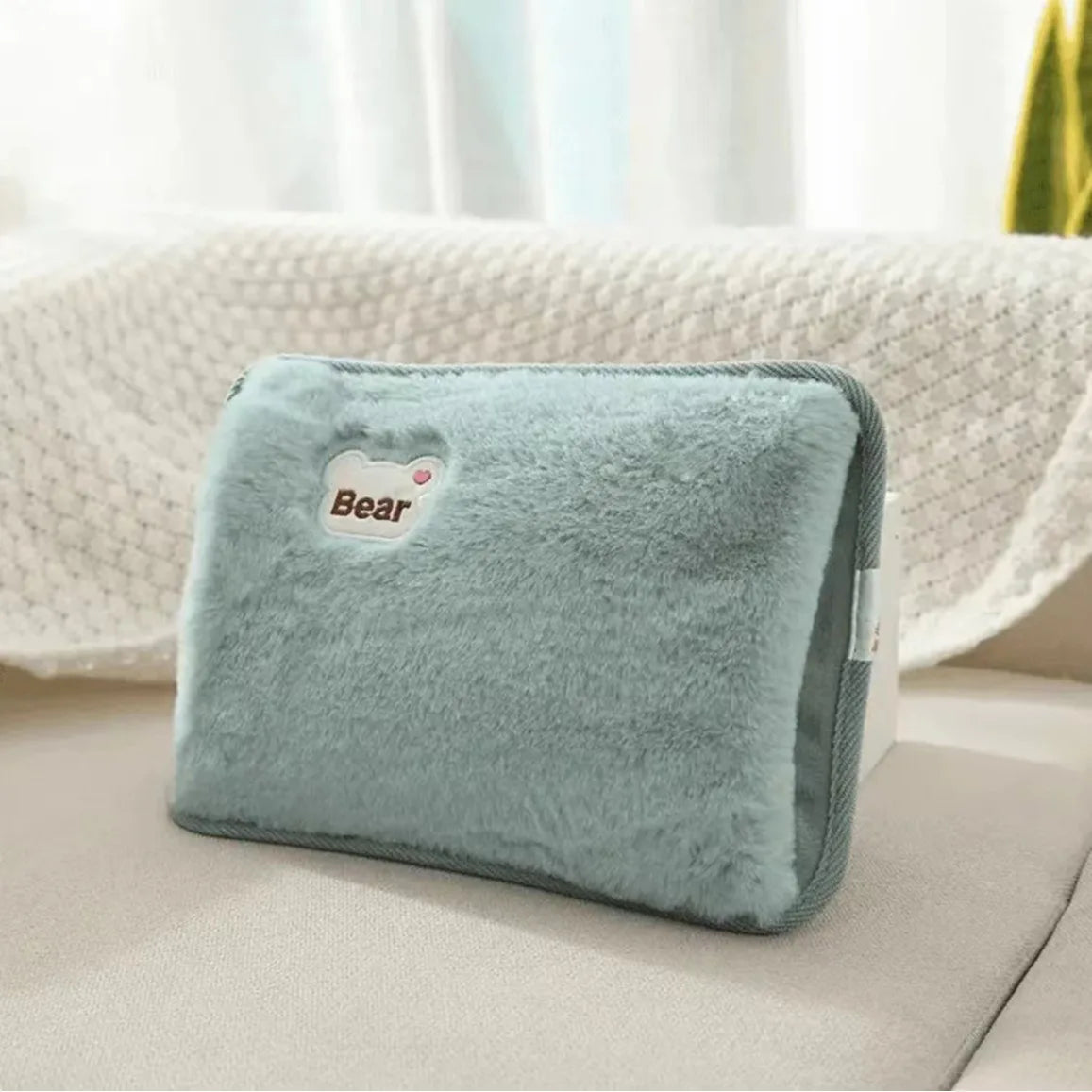 Bouillotte électrique pour avant bras