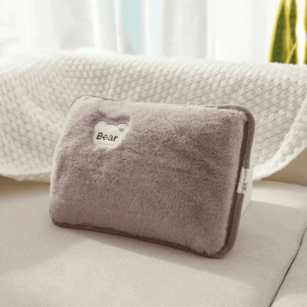 Bouillotte électrique pour avant bras