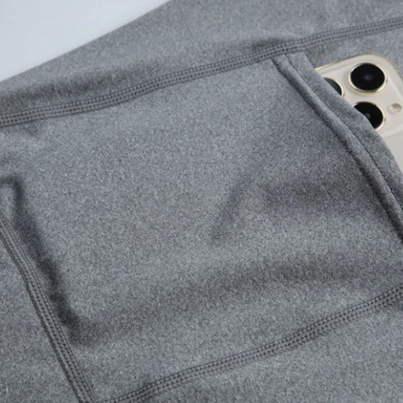 Short de compression avec poche pour homme