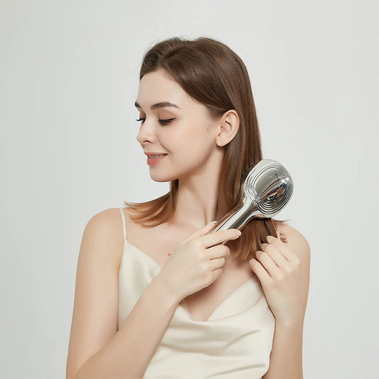 Appareil de massage tête portable et compact
